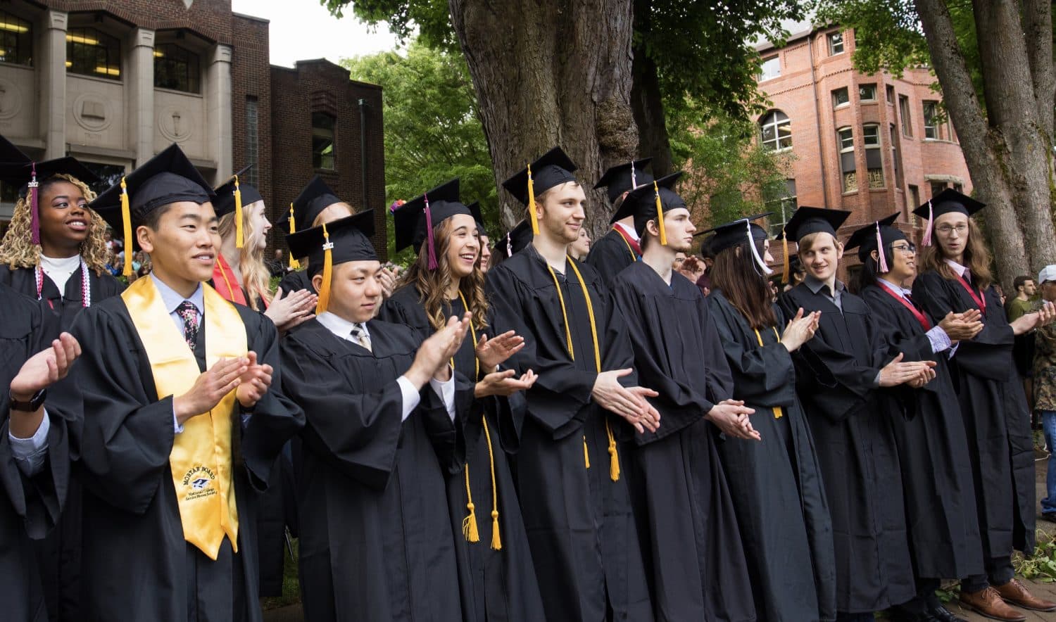 SPU graduates at Ivy Cutting