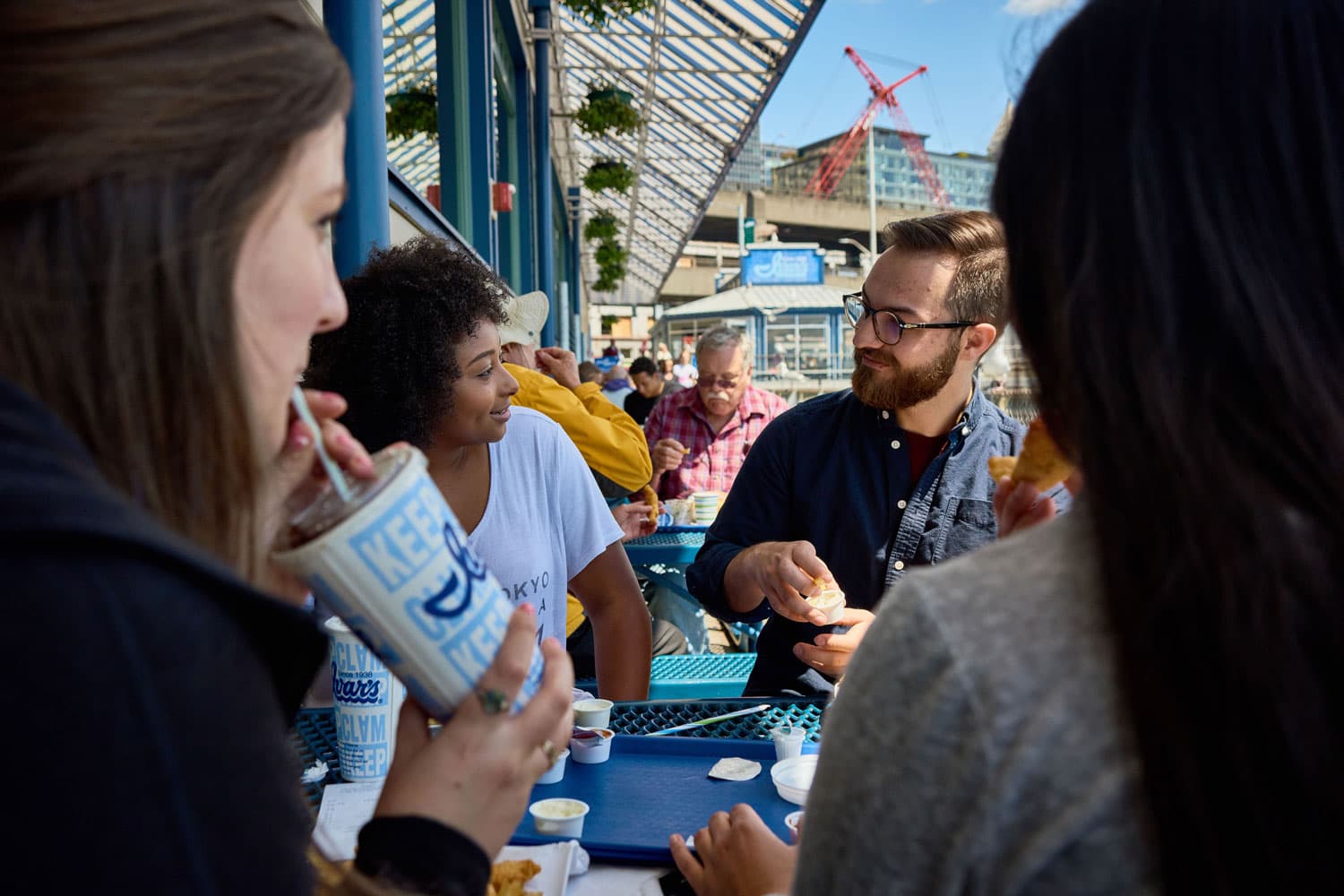 students enjoying meal at Ivar's on the Seattle waterfront