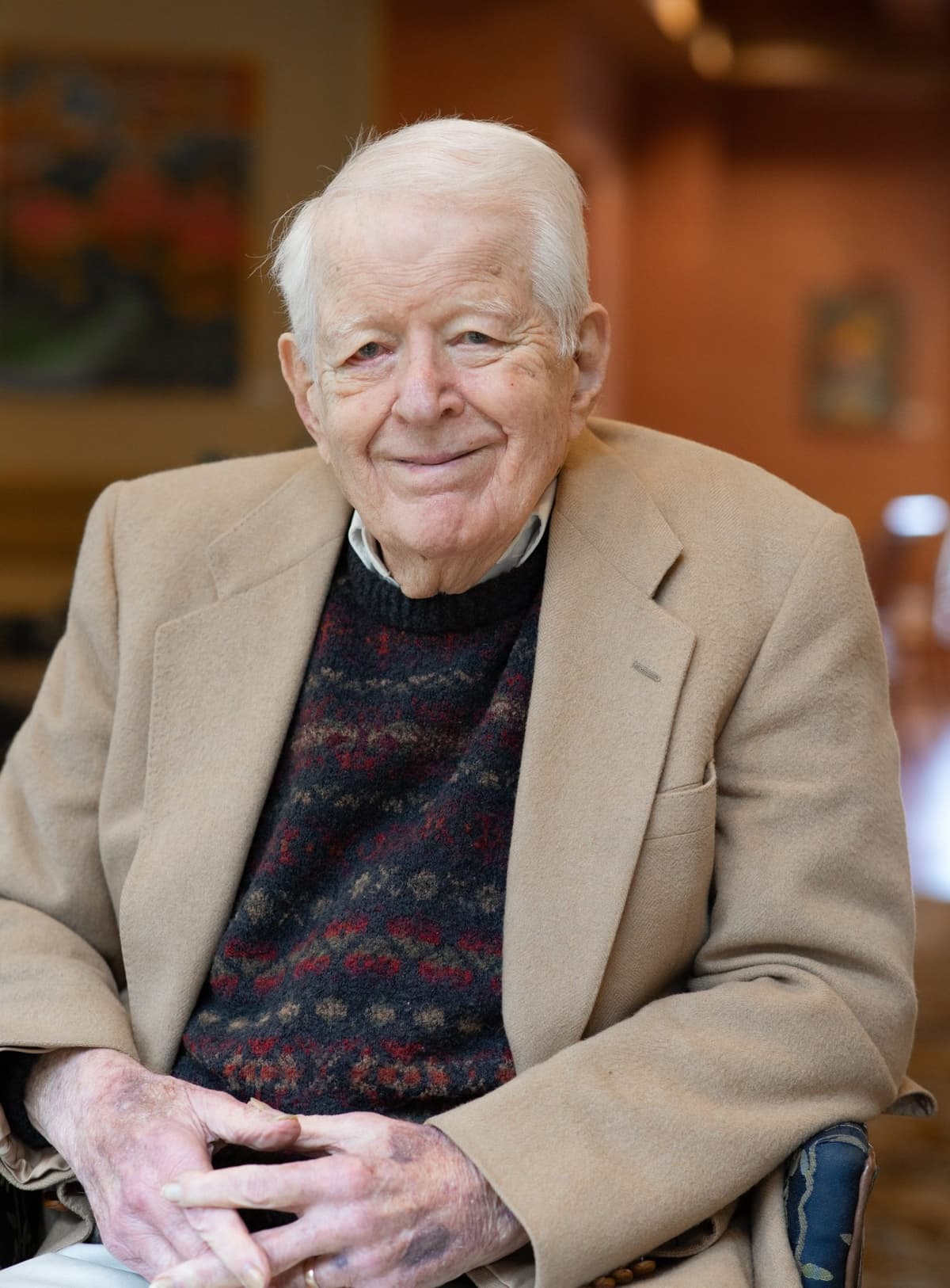 Professor Emeritus Wes Lingren seated in a chair.