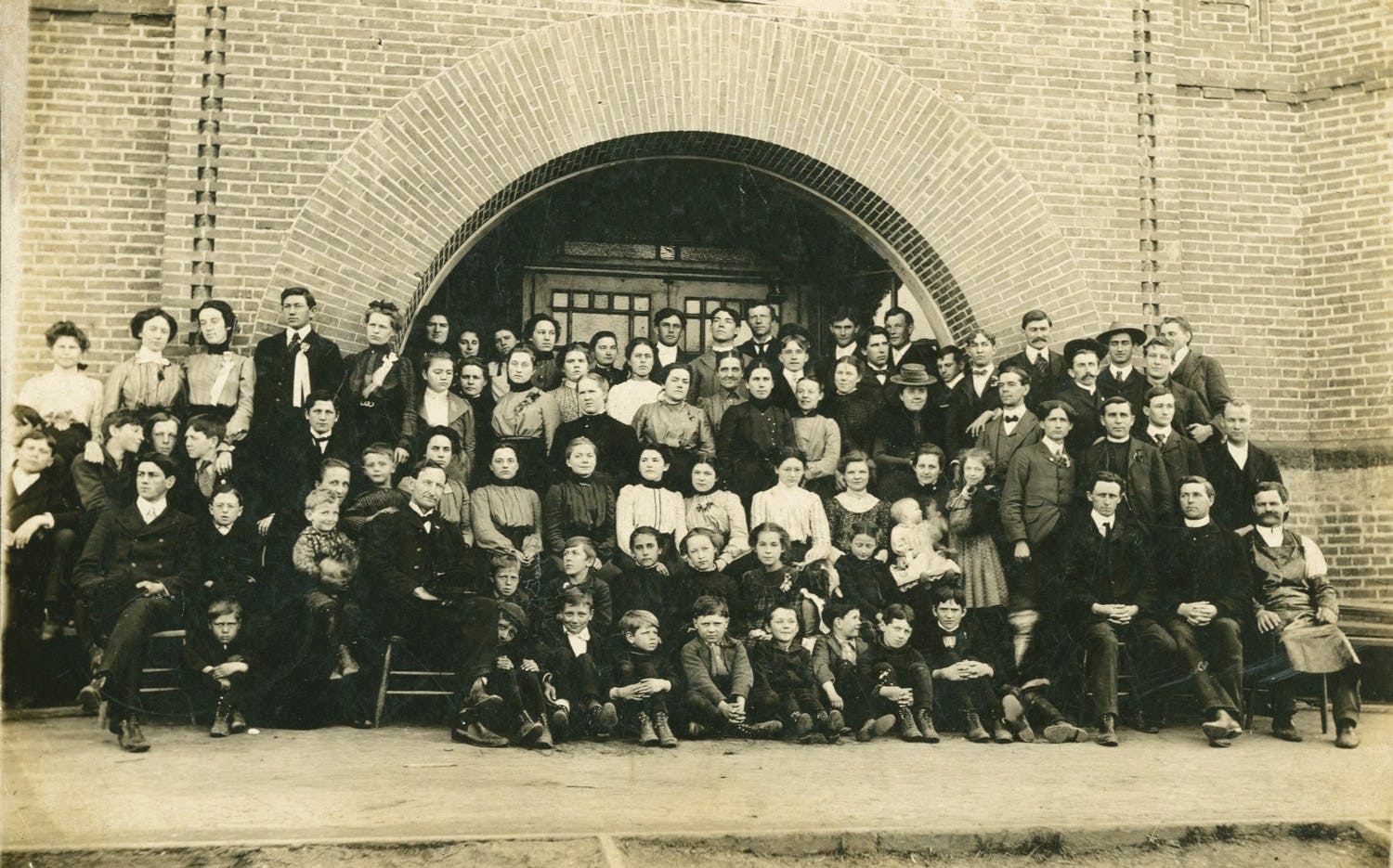 Seattle Seminary faculty and students in front of Alexander Hall