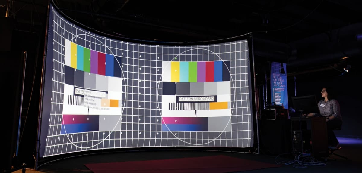 Lisa Marchisio calibrates the projection software for the curved screen