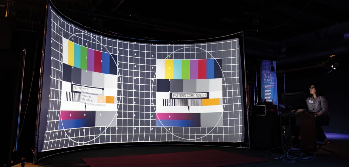 Lisa Marchisio calibrates the projection software for the curved screen