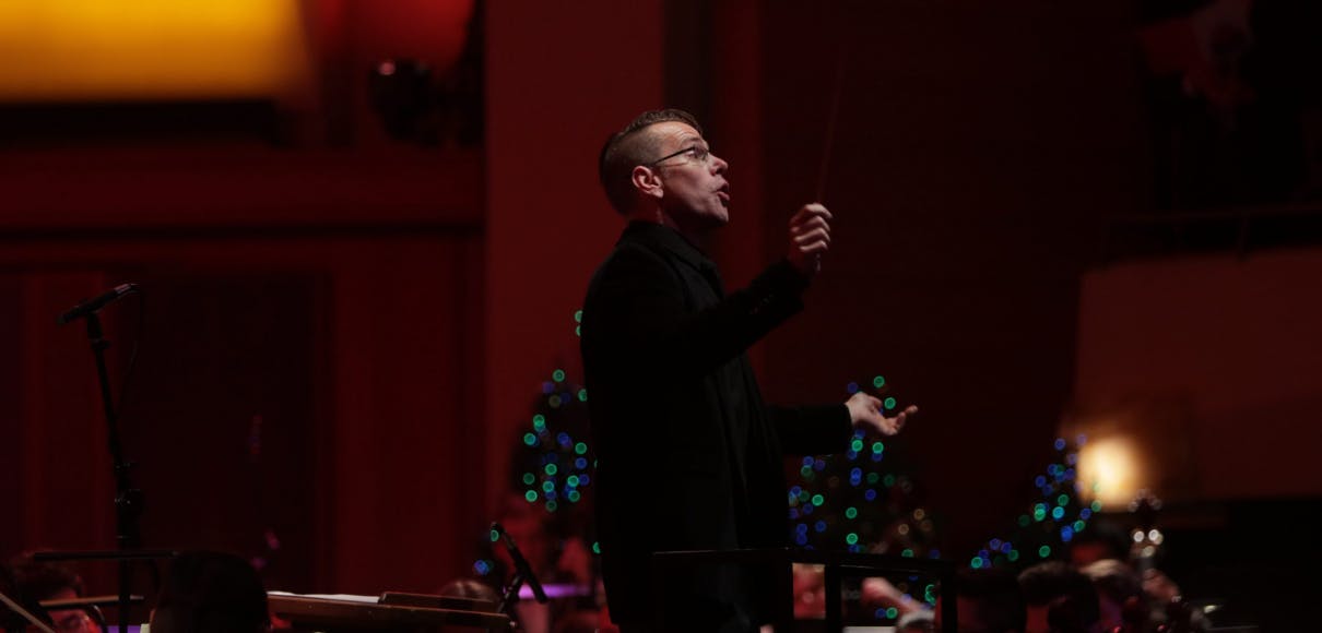 Danny Helseth conducts during the 2018 Sacred Sounds of Christmas concert | photo by Mike Siegel