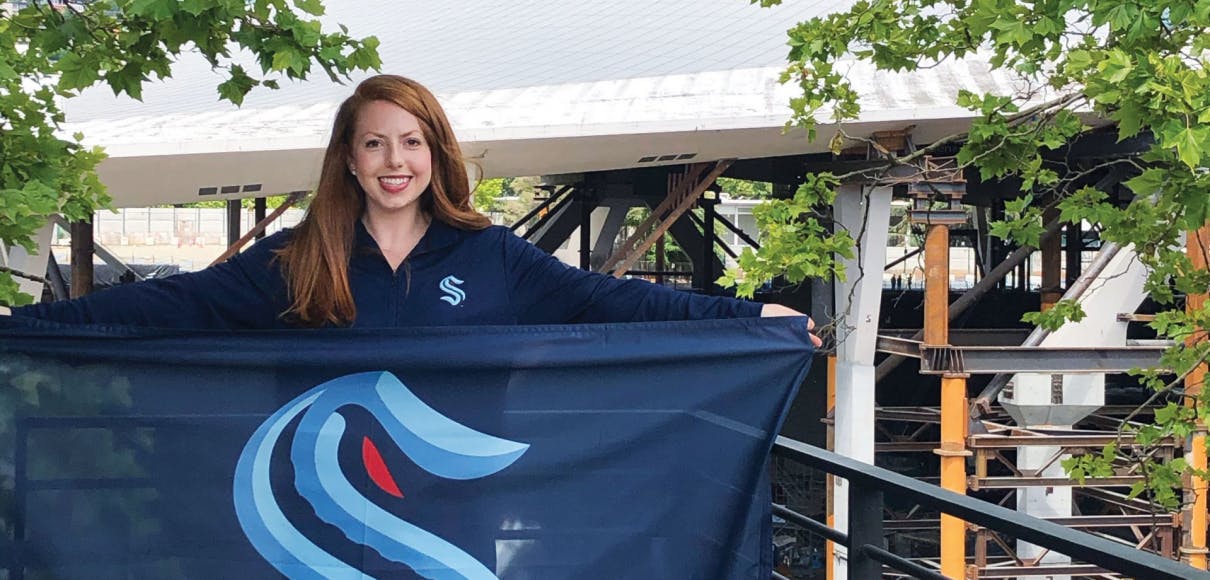 Becka Magnenat displays the Seattle Kraken flag