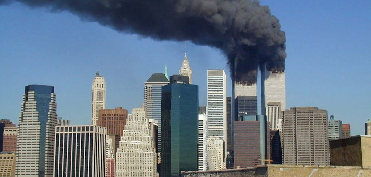 Smoke billows from The World Trade Center following the terrorist attacks on September 11, 2001