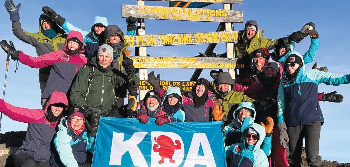 The kidney donors pose at the top of Mount Kilimanjaro | photo by Tom Racek of Summit Pointe Productions