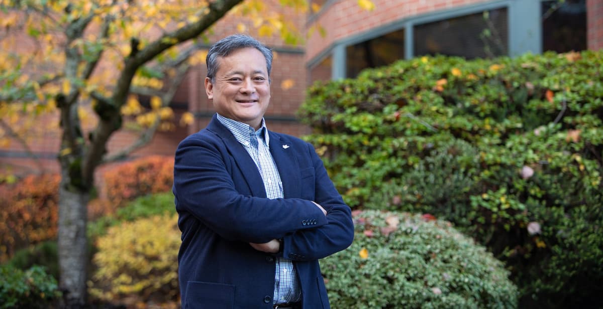 Dr. James Yeh, dean of the College of Business and Technology, in front of McKenna Hall.